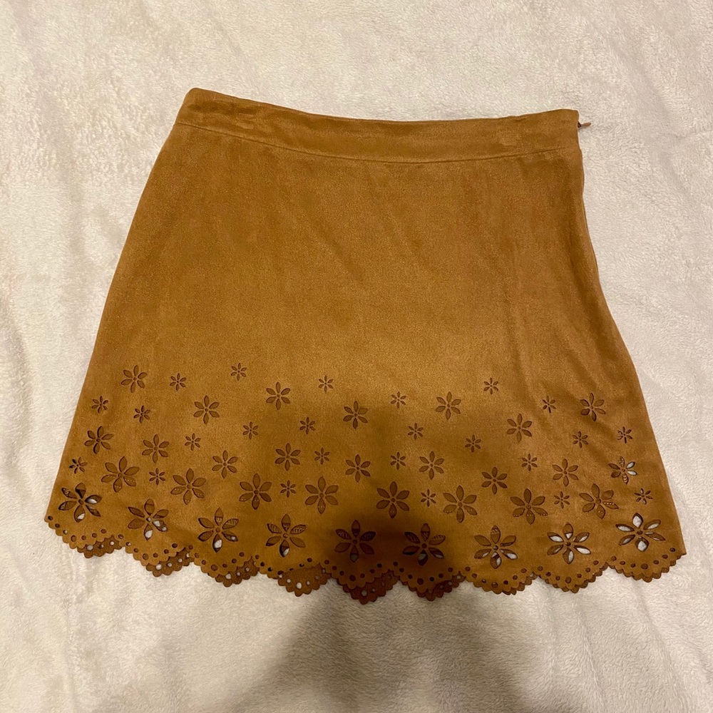 Lightly used Faux suede flower cutout skirt.